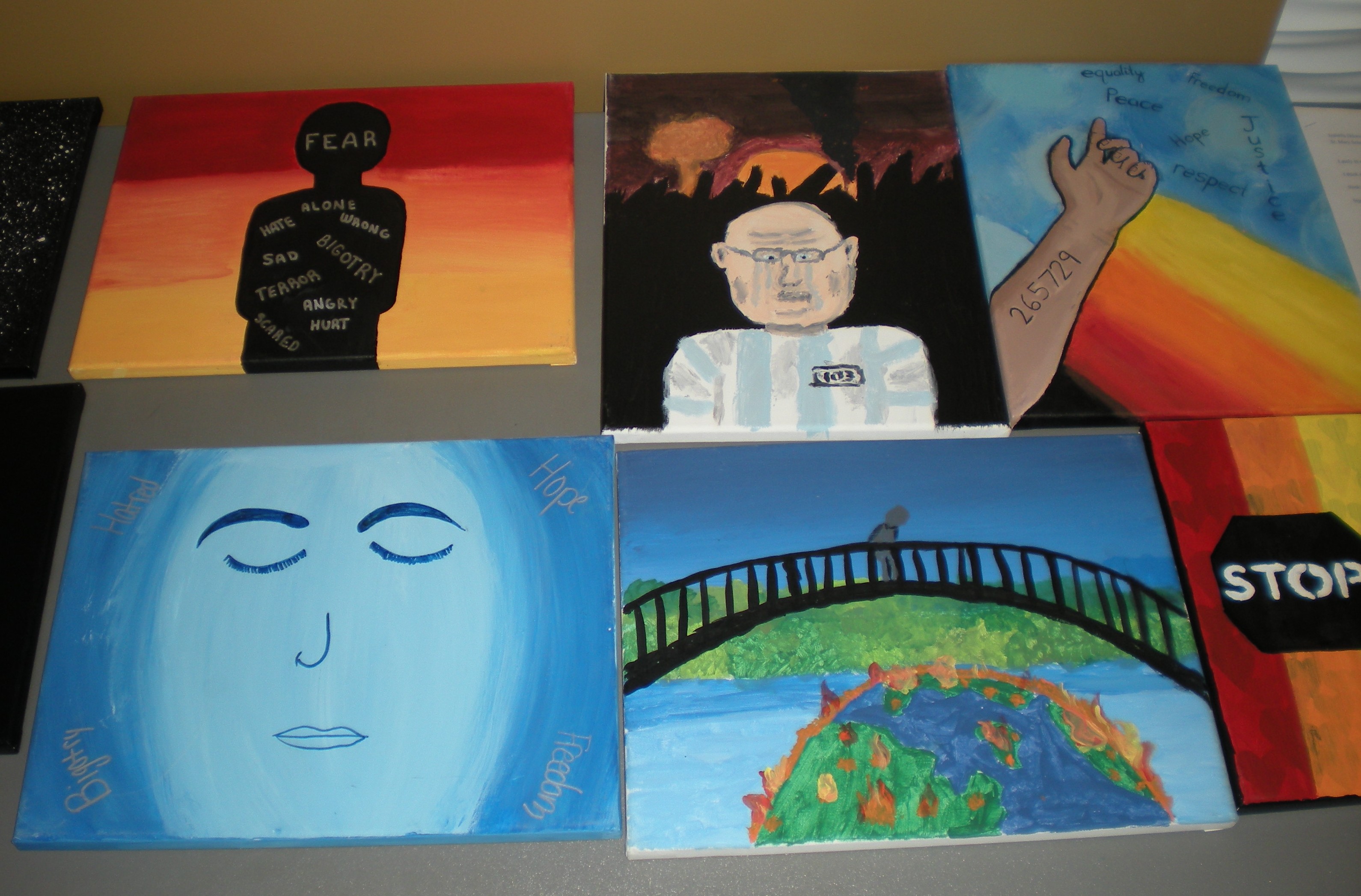 Student posters on a wall. 