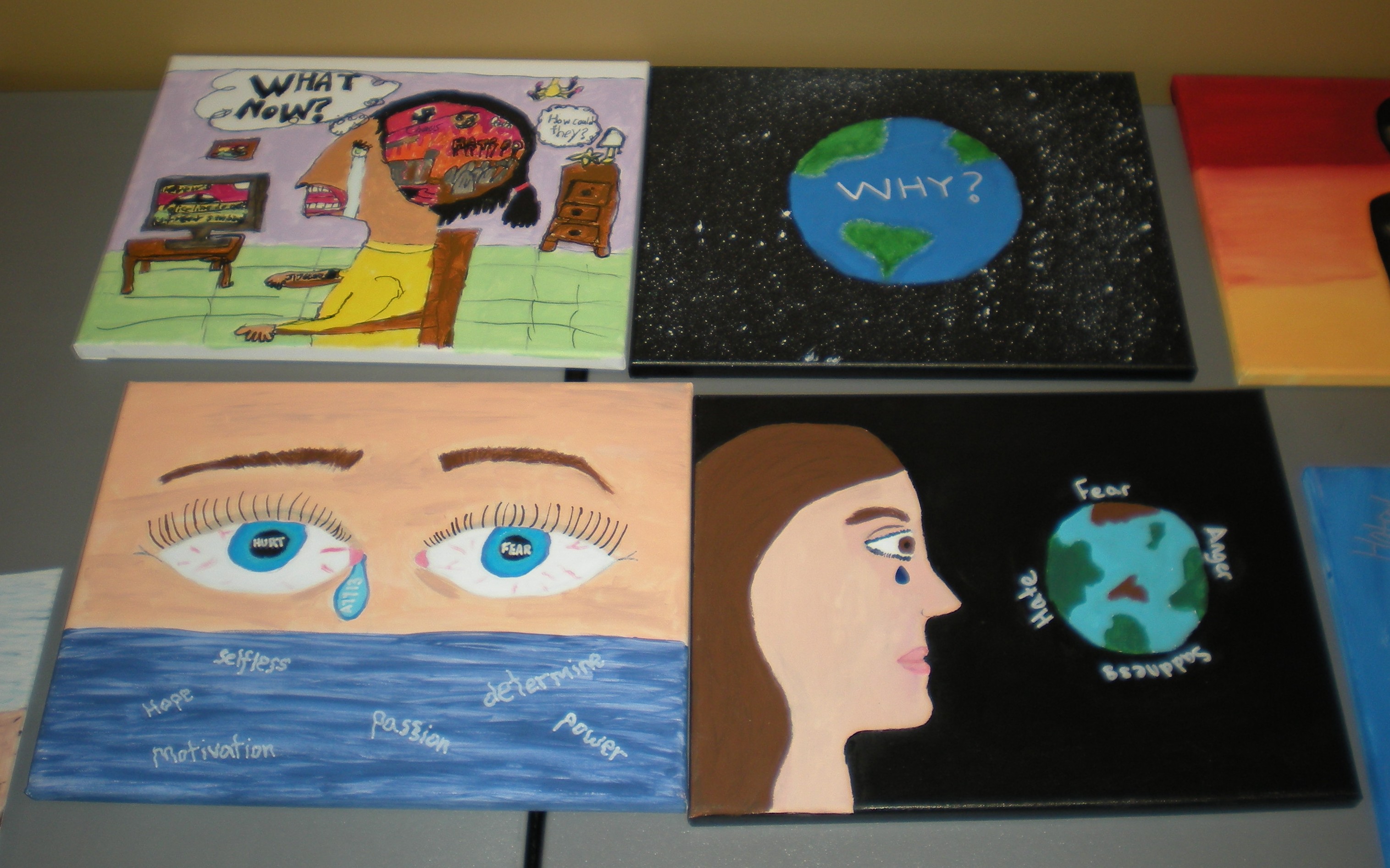 Student posters on a wall. 
