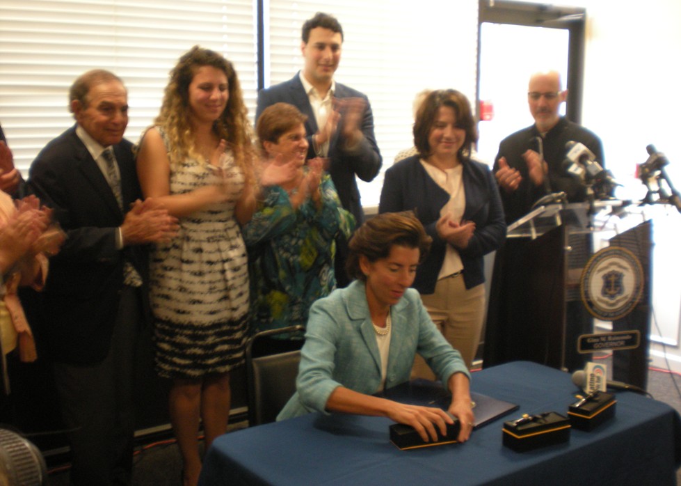 Rhode Island Gov. Raimondo signed the Holocaust and genocide education into law.